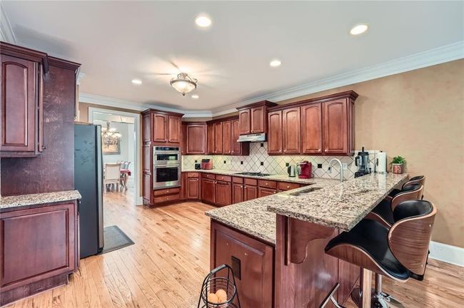 1025 Ector Dr Nw, House other with 7 bedrooms, 6 bathrooms and null parking in Kennesaw GA | Image 8