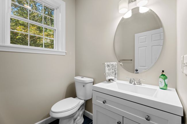 Guest half bath main level | Image 14