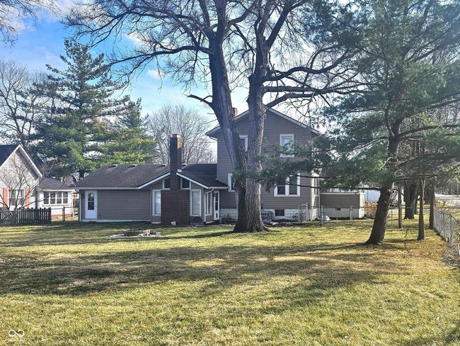back of property with spacious fenced yard | Image 14
