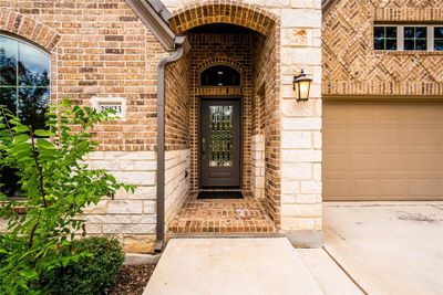 Beautiful brick exterior and recently painted front door. | Image 2