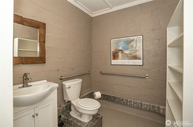 bathroom in front building | Image 12