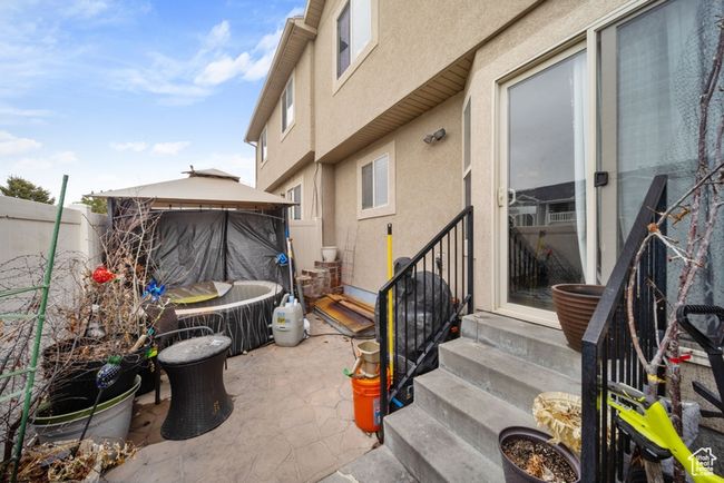 View of patio / terrace featuring entry steps, a gazebo, and fence | Image 20