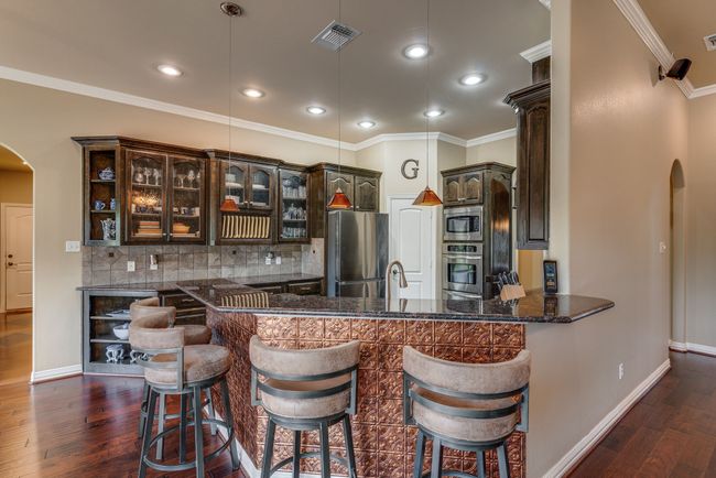 Chef's Kitchen, Custom Glass-Insert Cabinets | Image 12