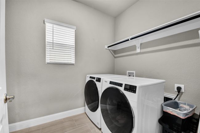 Laundry room is quite large | Image 13