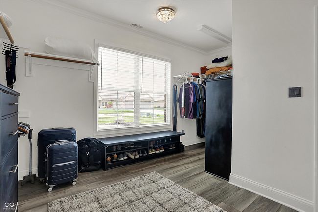 spacious closet with wood finished floors and visible vents | Image 30