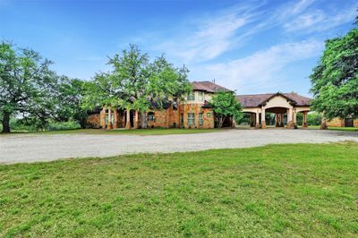 Beautiful custom built home on over 10 fully fenced acres with top of the line finish out. | Image 1