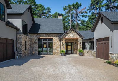 View of front of property featuring french doors and a garage | Image 3