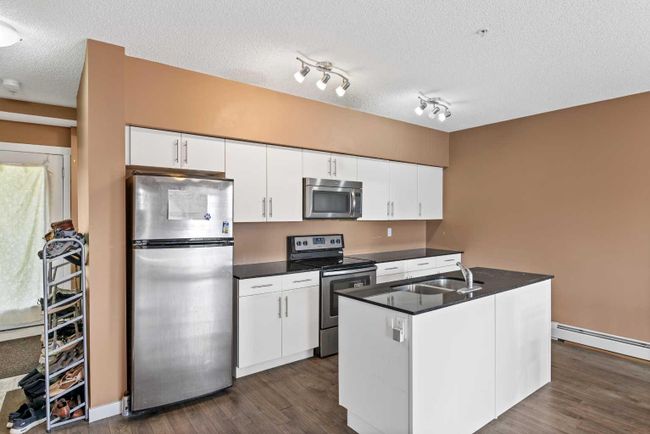 305 - 1740 9 Street Nw, Home with 3 bedrooms, 1 bathrooms and 1 parking in Calgary AB | Image 6