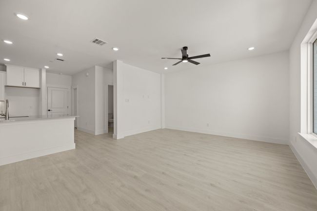 This spacious, light filled family room is the perfect place to host friends and family for the holidays or any time! | Image 6