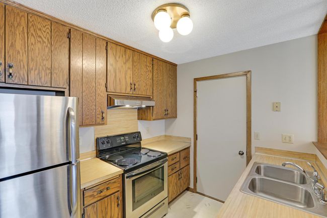 8624 S Maplebrook Cir, Townhouse with 2 bedrooms, 1 bathrooms and null parking in Brooklyn Park MN | Image 8