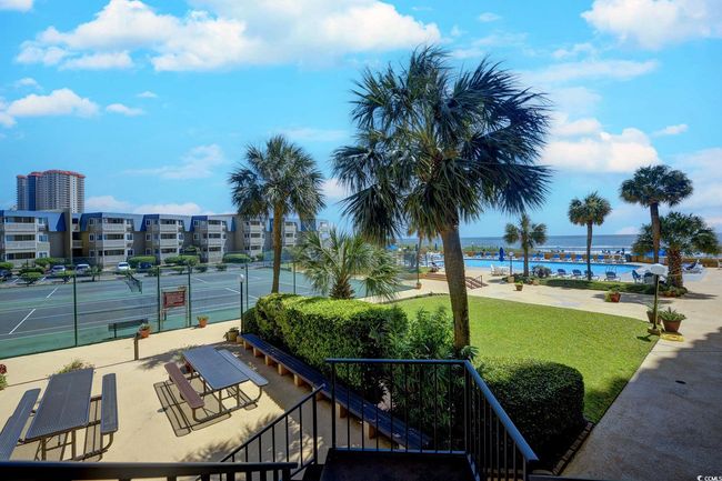 Surrounding community with a water view, a yard, and tennis court | Image 32