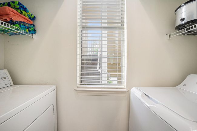 Washroom with washer and clothes dryer | Image 19