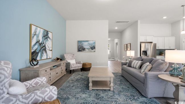 Living room featuring wood finished floors, baseboards, and recessed lighting | Image 14