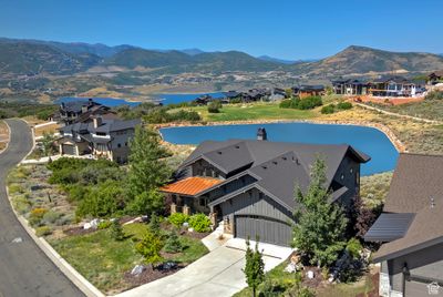 Birds eye view of property with a water and mountain view | Image 3