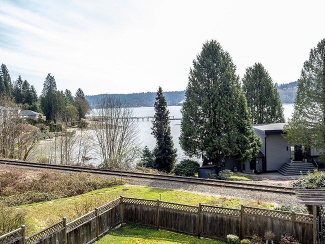 Water view featuring a fenced backyard | Image 32