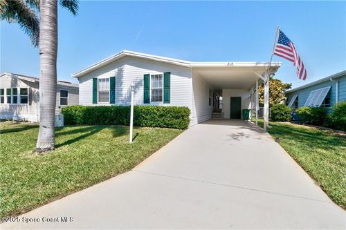 318 Macadamia Dr, Barefoot Bay, FL, 32976-6824 | Card Image