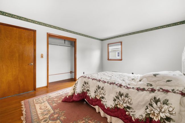 Bedroom featuring light wood-style floors | Image 24