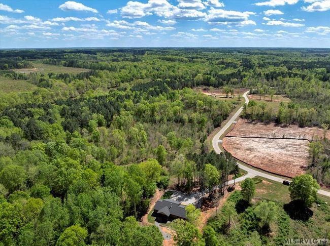 Aerial from lake area to roadside and beyond | Image 19