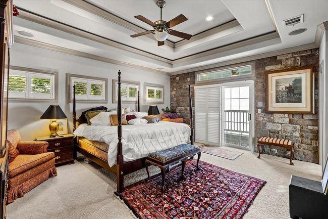 Imagine waking up each morning to breathtaking views of the bay right from your bed. Open the French doors to your private balcony and let the fresh bay breeze and the soothing sounds of nature greet you. Whether you’re sipping coffee as the sun rises or relaxing in the evening with a book, the panoramic water views and tranquil surroundings offer a daily escape from the ordinary. | Image 28