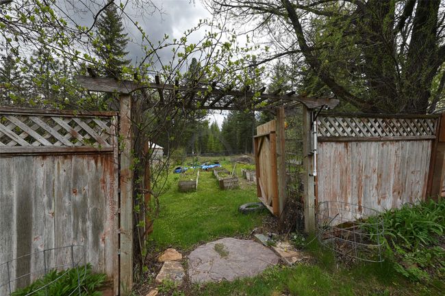 View of yard with a gate | Image 71