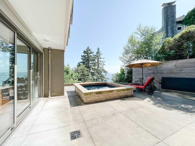 View of patio / terrace featuring an outdoor hot tub | Image 28