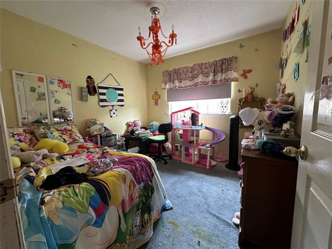 View of carpeted bedroom | Image 9