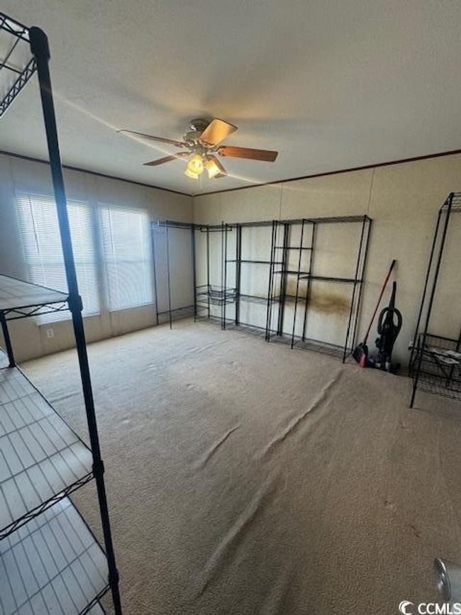 View of unfurnished living room | Image 8