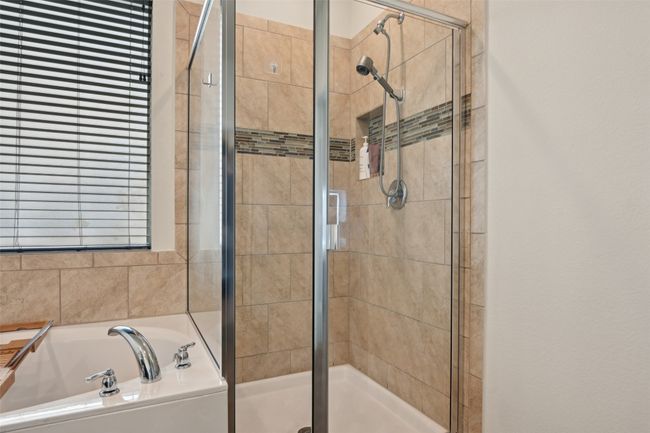 Full bath featuring a garden tub and a shower stall | Image 33