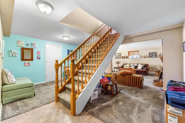 Stairway down to the finished basement. | Image 16