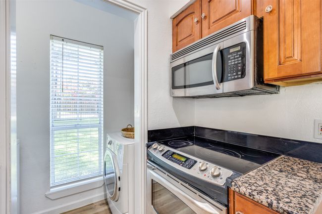 Washer and dryer included, directly off kitchen. | Image 9
