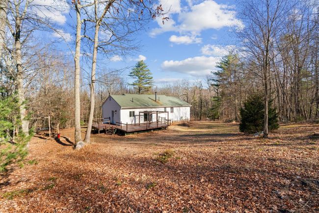 View of side of home featuring a back deck | Image 20