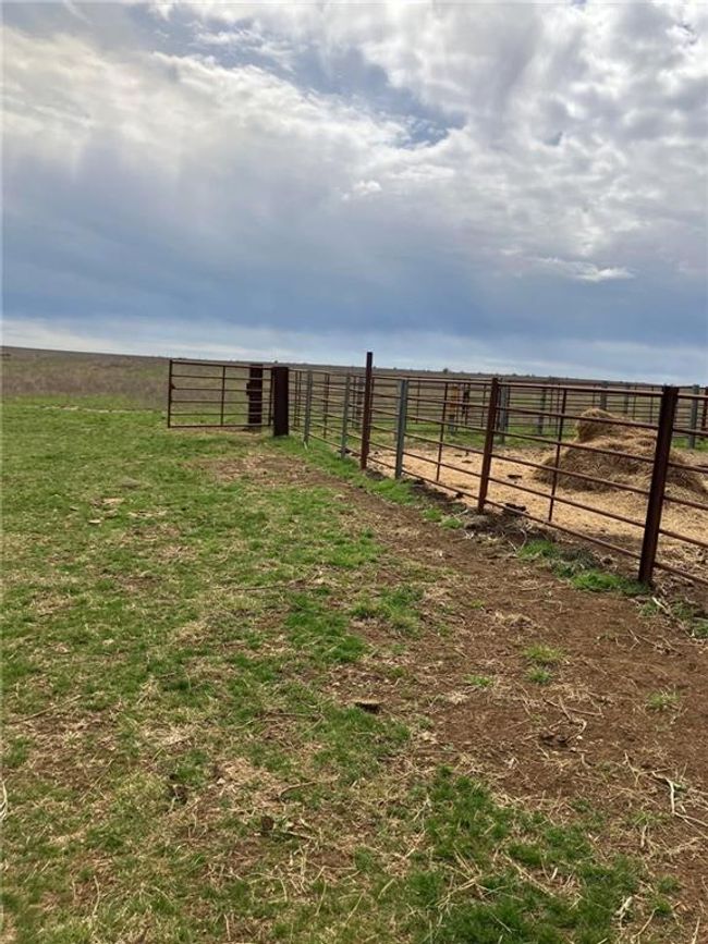 View of yard with fence and a rural view | Image 17