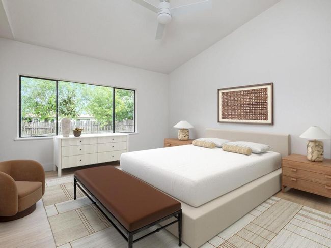 Bedroom featuring lofted ceiling, light wood-type flooring, and a ceiling fan | Image 5