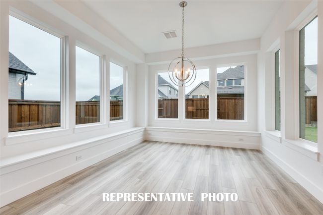Grand dinner parties are in your future in this wonderful, light filled dining room! REPRESENTATIVE PHOTO. | Image 11