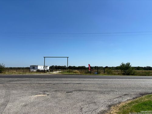 1205 W Hondo Ave, Devine, TX, 78016-1933 | Card Image