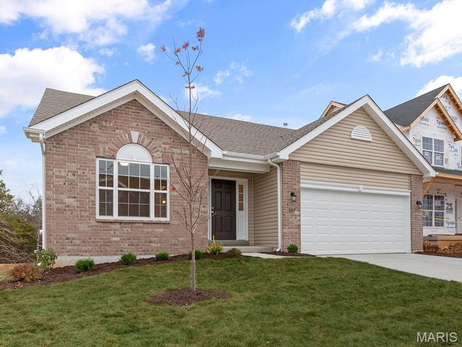 Ranch-style house with brick siding, concrete driveway, an attached garage, and a front yard | Image 23