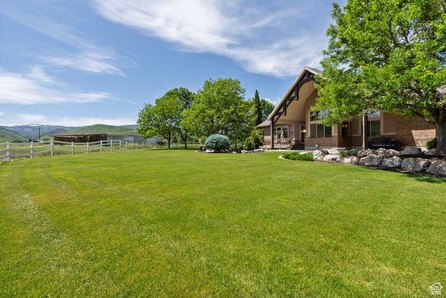 View of yard featuring a mountain view | Image 11