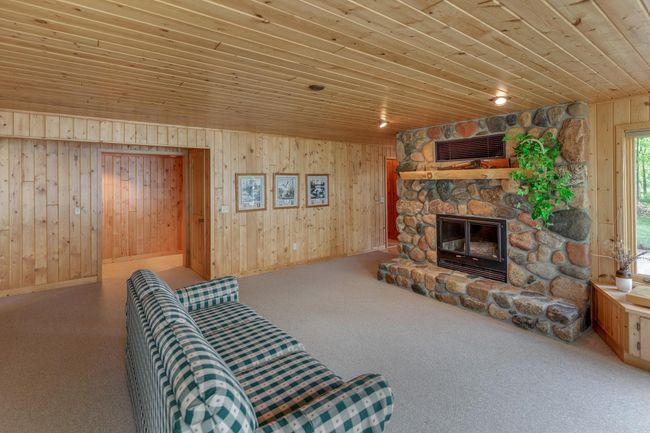Absolutely gorgeous fireplace! Relax and take in the lake side views! | Image 28