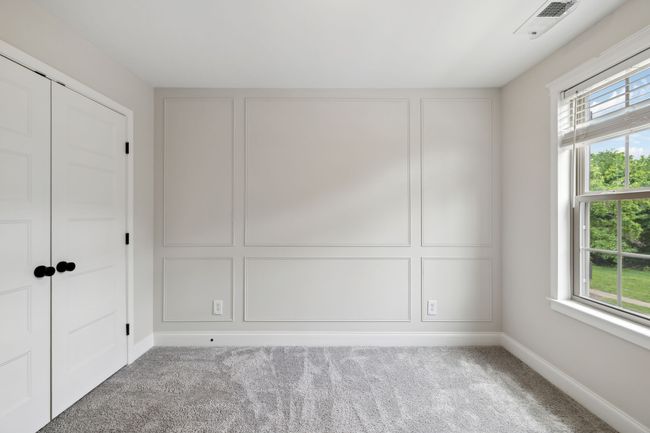 Secon bedroom. Be sure to check out the custom shelving in the closet. | Image 25