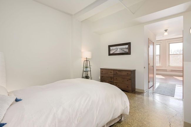 Oversized bedroom with vintage terazzo floors. | Image 13