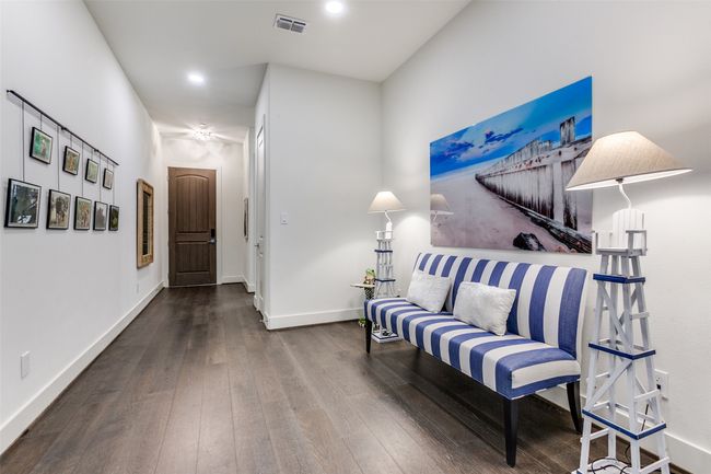 Sitting room or flex space. This area could also be the dining area. There is also room for two low profile comfortable reading chairs. | Image 4