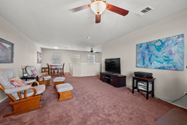 Multiple ceiling fans, several windows. | Image 16