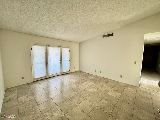 Empty room featuring a textured ceiling | Image 20