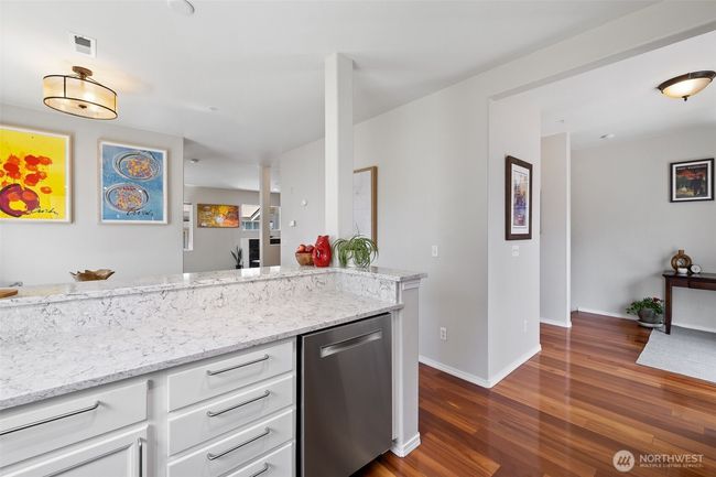 View from the kitchen showing access to the W/D, pantry and access to the garage | Image 19