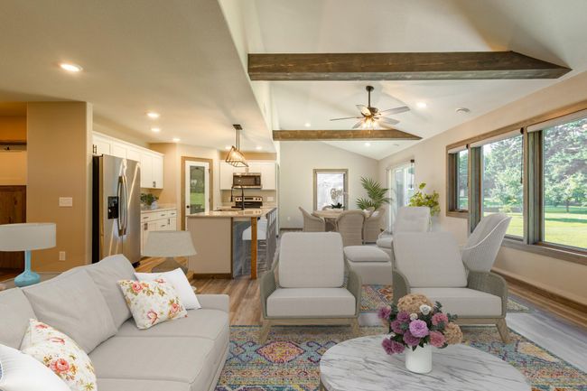 Large Main Level living space with a patio door to the backyard | Image 6