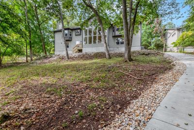 Concrete path leading to the lake for easy access. | Image 3