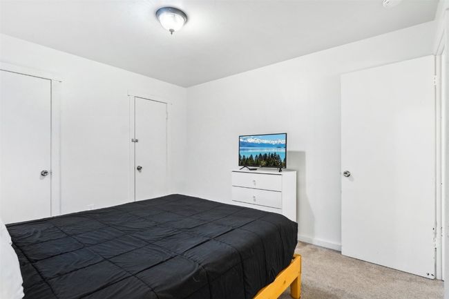 Bedroom with carpet flooring | Image 21