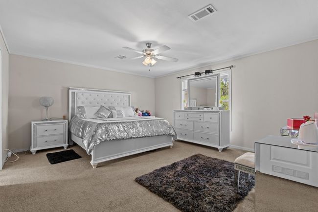 The centerpiece is a spacious 2, 061 sq ft manufactured home, just 1.5 years old, with 4 bedrooms, 2 bathrooms, and a beautifully crafted 40' x 20' stone outdoor kitchen under a covered roof with lighting—ideal for hosting under the stars. | Image 10