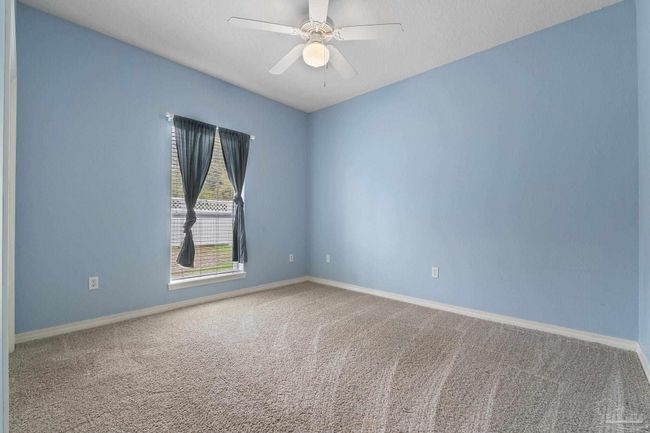 7008 Turnberry Cir, House other with 4 bedrooms, 2 bathrooms and 3 parking in Navarre FL | Image 20