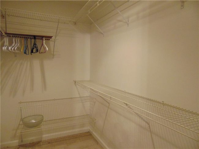 Walk-in closet in Primary Bedroom | Image 18